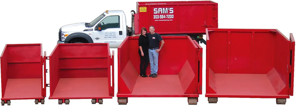 What Is the Best Dumpster Rental Software for Your Business? — Sam's Hauling family-owned crew with their full red roll-off fleet lineup in Denver